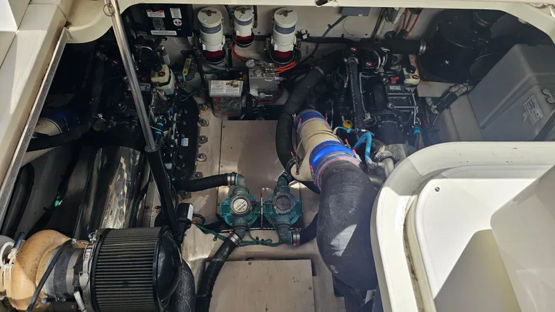 Slide: The Image of Engine room of 2016 Sea Ray 470 Sundancer yacht, showcasing mechanical components. - 36