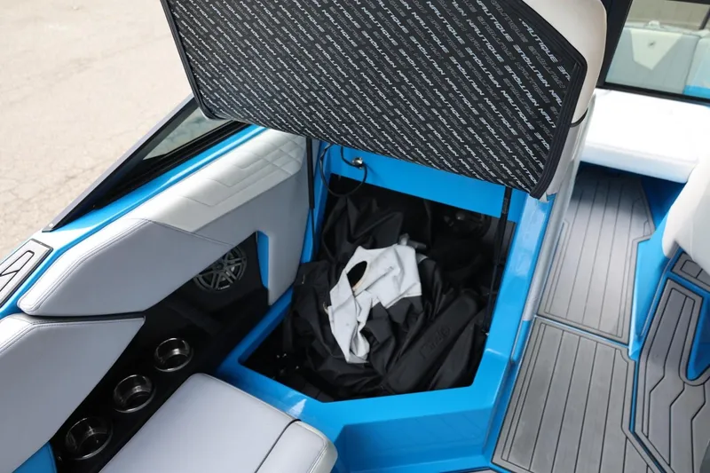 Slide: The Image of Interior controls of 2022 Nautique Super Air Nautique S23 boat, featuring sleek design and modern technology. - 21