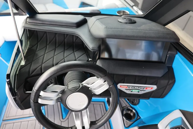 Slide: The Image of Touchscreen display of 2022 Nautique Super Air Nautique S23 boat dashboard. - 29