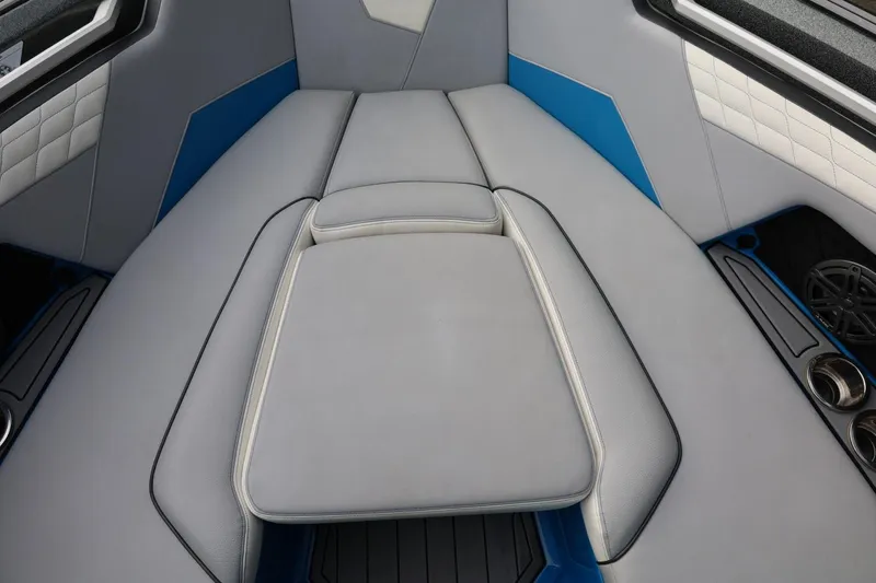 Slide: The Image of Control panel of 2022 Nautique Super Air Nautique S23 boat, featuring sleek design and buttons. - 33