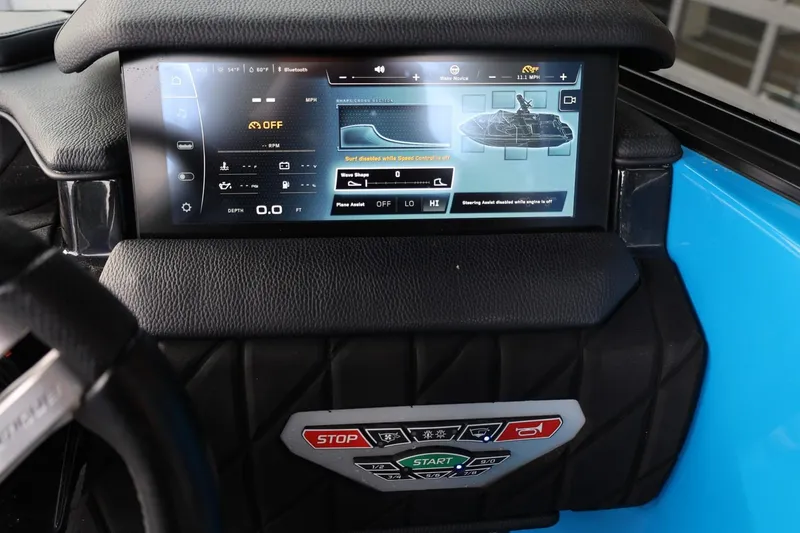 Slide: The Image of 2022 Nautique Super Air Nautique S23 tower controls with power, up, and down buttons. - 34