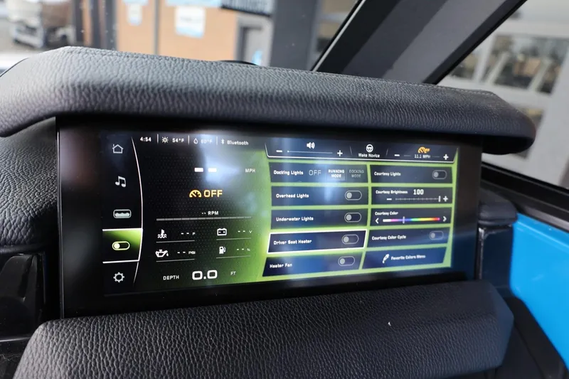 Slide: The Image of 2022 Nautique Super Air Nautique S23 boat, blue and gray deck, top view. - 38