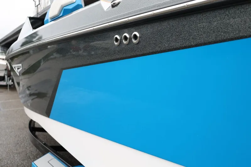 Slide: The Image of 2022 Nautique Super Air Nautique S23 boat, blue and gray exterior detail. - 87