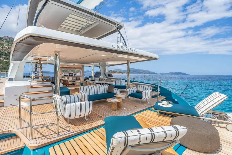 Slide: The Image of Manufacturer Provided Image: Luxurious Lagoon Eighty 2 yacht, 2026 model, with elegant deck seating and ocean view. - 5