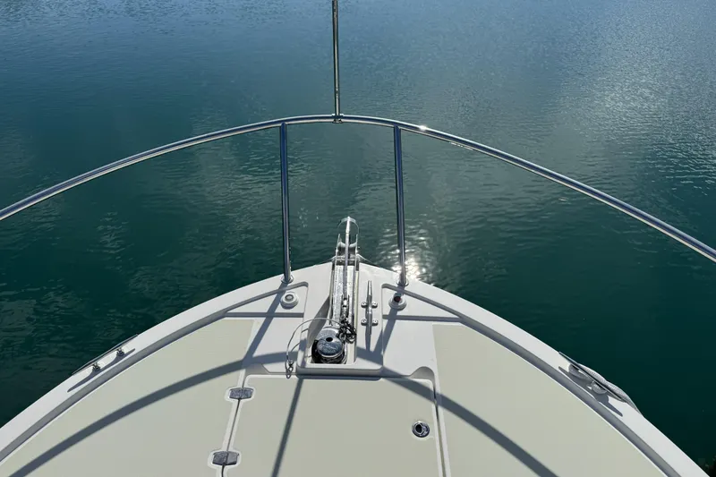Slide: The Image of Bow view of 2020 Back Cove 34O boat on calm water. - 13