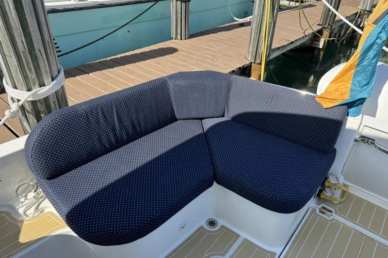 Slide: The Image of Blue polka dot seating on 2020 Back Cove 34O boat at dock. - 22