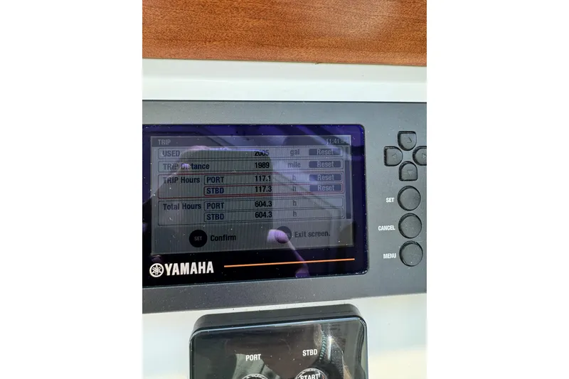 Slide: The Image of Yamaha display on 2020 Back Cove 34O showing trip and engine hours. - 32