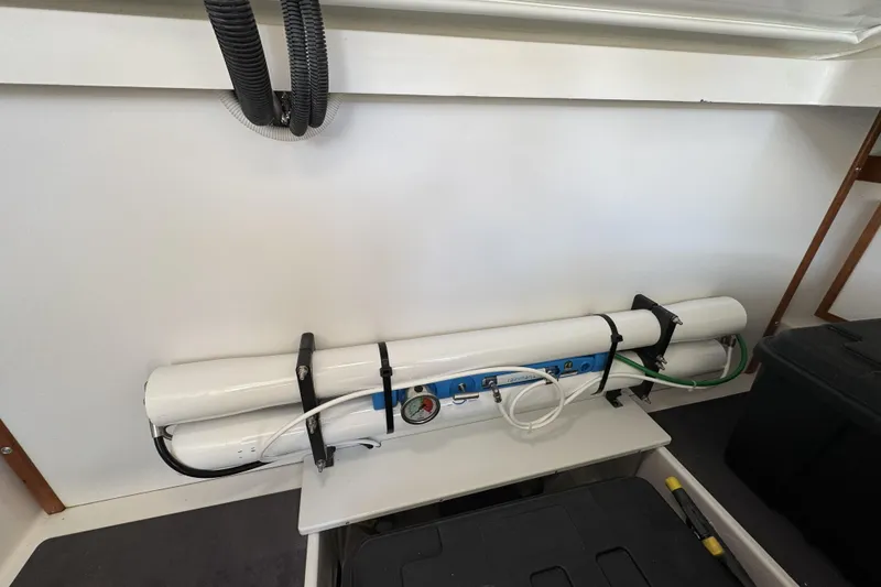 Slide: The Image of Marine equipment in a 2020 Back Cove 34O boat, featuring pipes and gauges. - 44