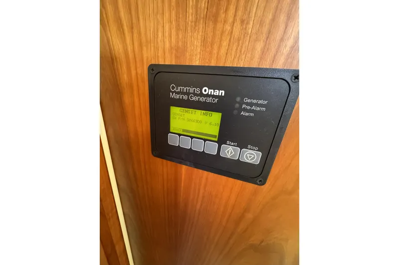 Slide: The Image of Cummins Onan marine generator control panel on 2020 Back Cove 34O boat. - 51