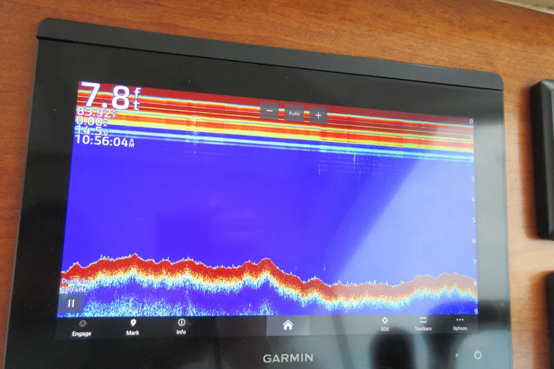 Slide: The Image of Garmin marine display on 2020 Back Cove 34O, showing sonar depth of 7.8 feet. - 56