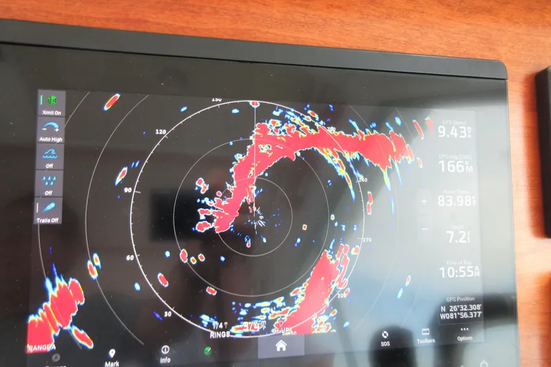 Slide: The Image of Radar display on 2020 Back Cove 34O boat showing navigation data and weather conditions. - 59