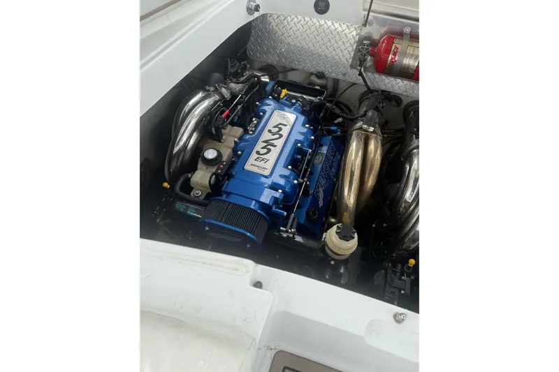 Slide: The Image of 2007 Cobalt 343 engine compartment featuring a Mercury 525 EFI engine. - 11