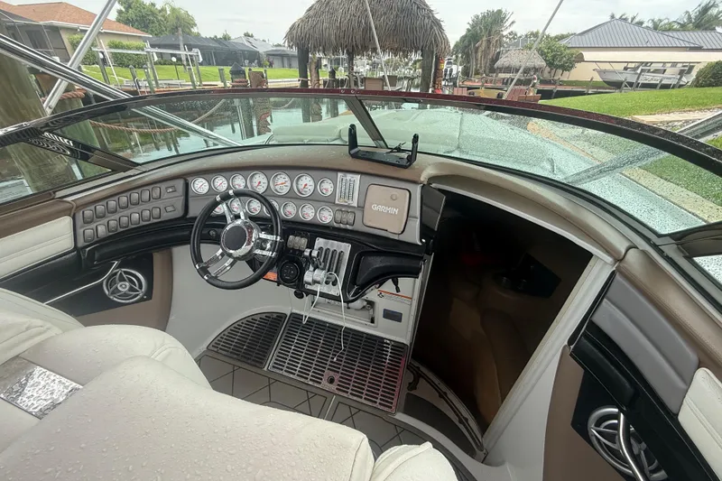 Slide: The Image of Cockpit of 2007 Cobalt 343 boat with steering wheel and instrument panel. - 6