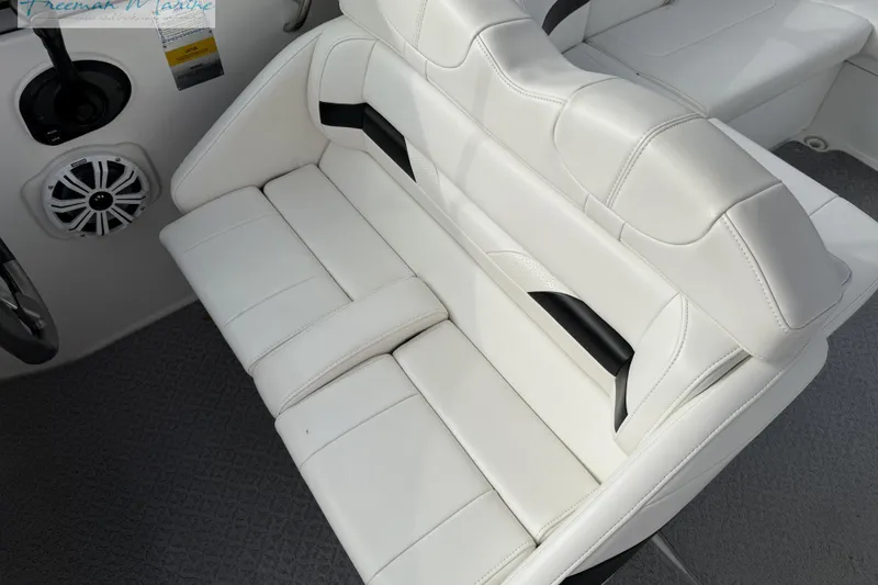Slide: The Image of White leather seating on a 2007 Formula 260 Bowrider boat, featuring sleek design and comfort. - 18