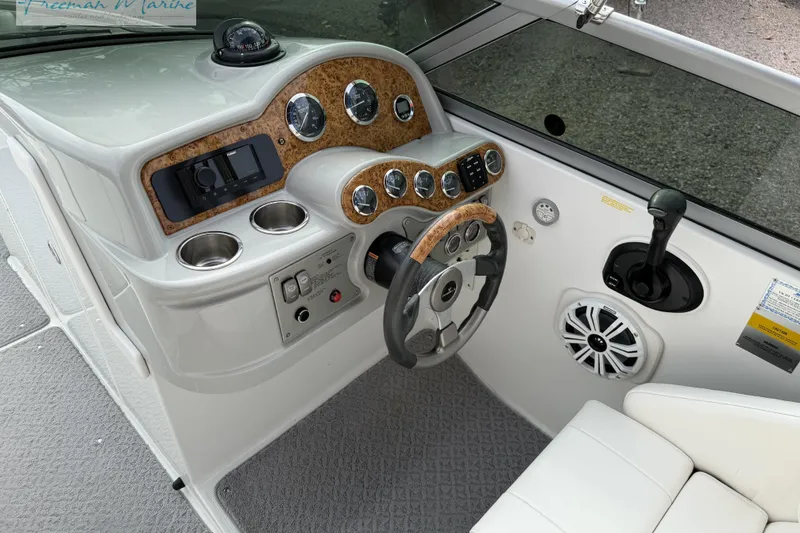 Slide: The Image of 2007 Formula 260 Bowrider dashboard with steering wheel, controls, and gauges. - 19