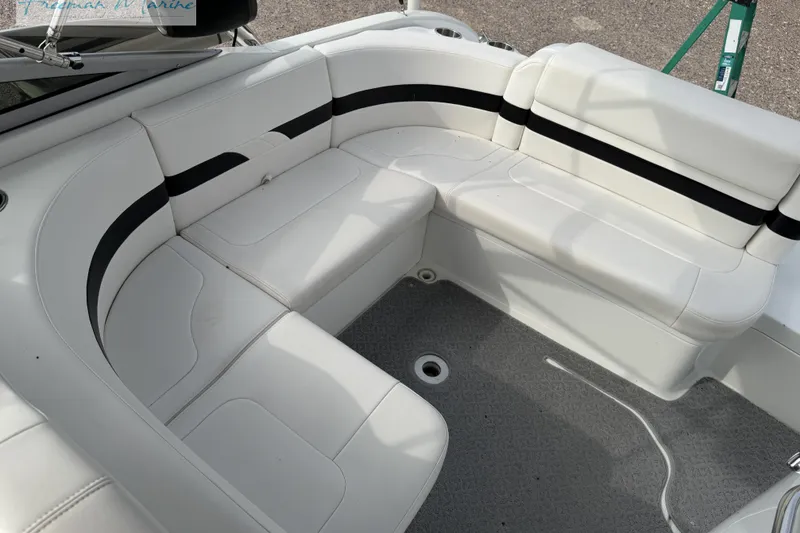 Slide: The Image of 2007 Formula 260 Bowrider interior with white seating and black accents. - 20