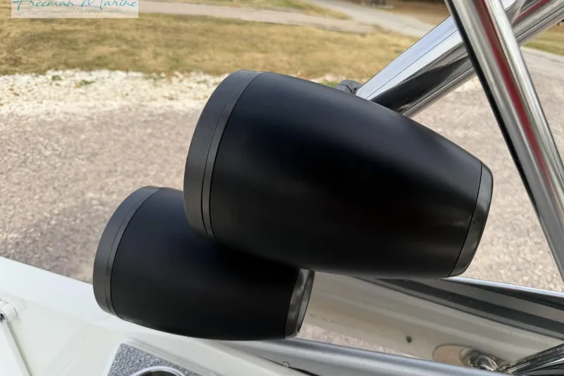 Slide: The Image of Close-up of black speakers on a 2007 Formula 260 Bowrider boat. - 21