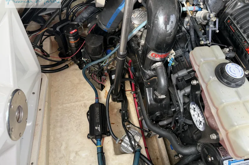 Slide: The Image of Engine compartment of a 2007 Formula 260 Bowrider with visible components and wiring. - 29