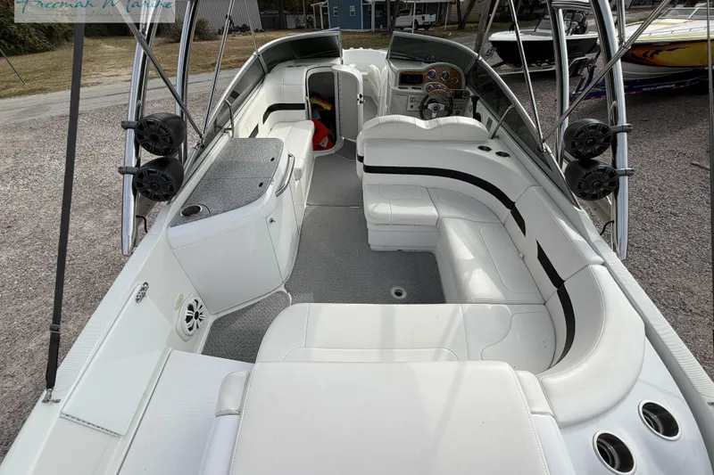 Slide: The Image of 2007 Formula 260 Bowrider interior with white seating and modern dashboard. - 9