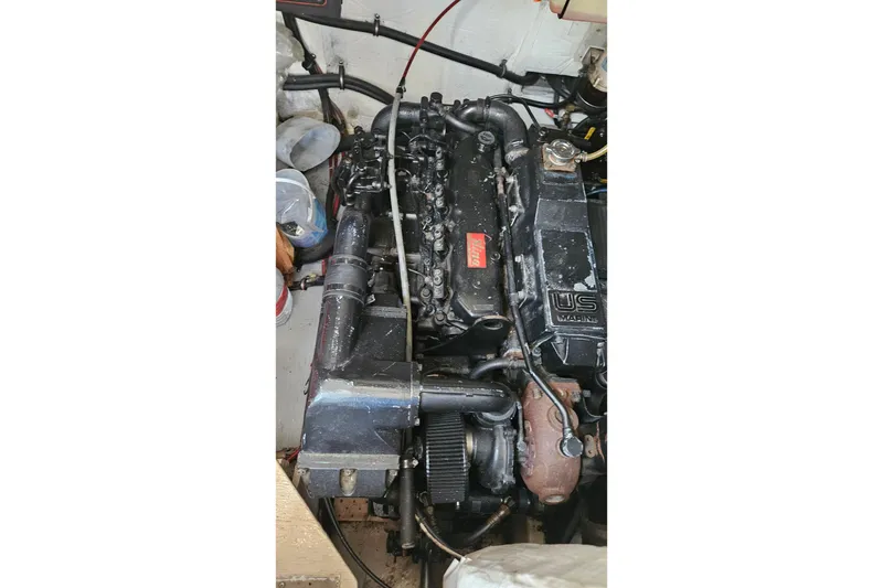 Slide: The Image of Engine of 1991 Bayliner 3888 Motoryacht, detailed view of mechanical components. - 39