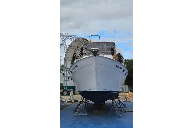 Slide: The Image of Cockpit of 1991 Bayliner 3888 Motoryacht with navigation instruments and steering wheel. - 5