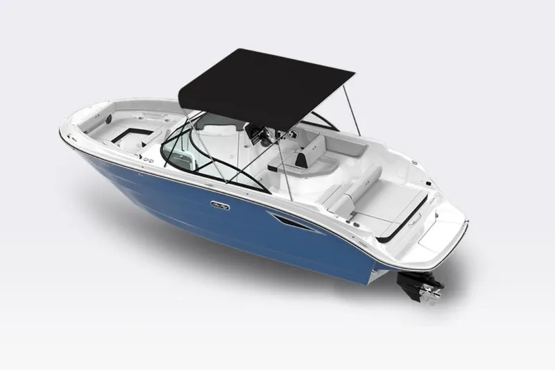 Slide: The Image of 2026 Sea Ray SDX 230 boat on trailer under clear blue sky. - 3