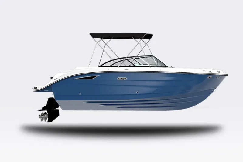 Slide: The Image of 2026 Sea Ray SDX 230 boat on trailer, blue hull, sunny day. - 1