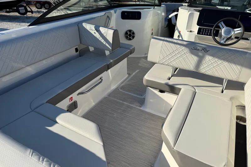 Slide: The Image of Interior of 2026 Sea Ray SDX 230 boat with luxurious seating and modern design. - 7