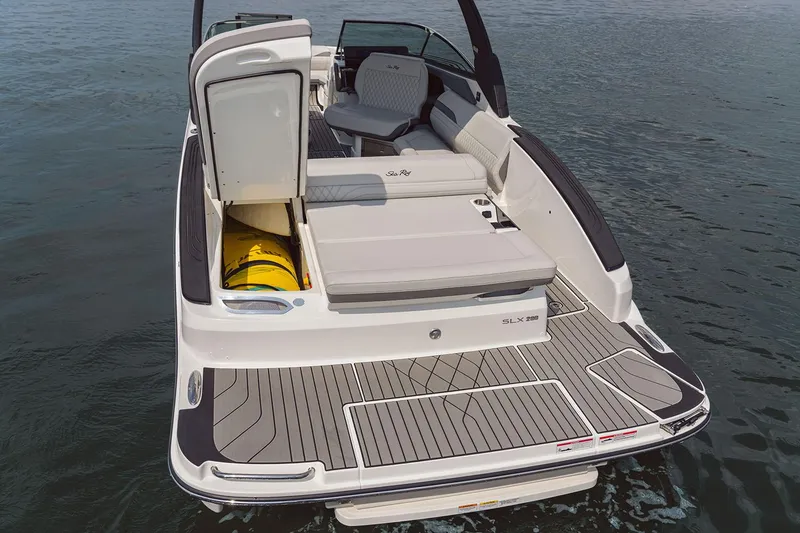 Slide: The Image of 2026 Sea Ray SLX 280 boat interior with luxurious seating and modern design. - 12