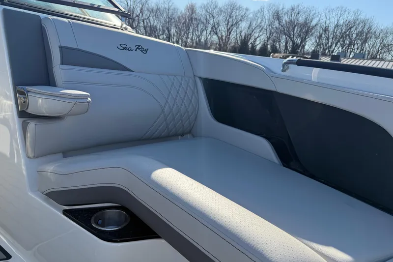 Slide: The Image of 2026 Sea Ray SLX 280 boat interior with luxurious seating and armrest. - 17