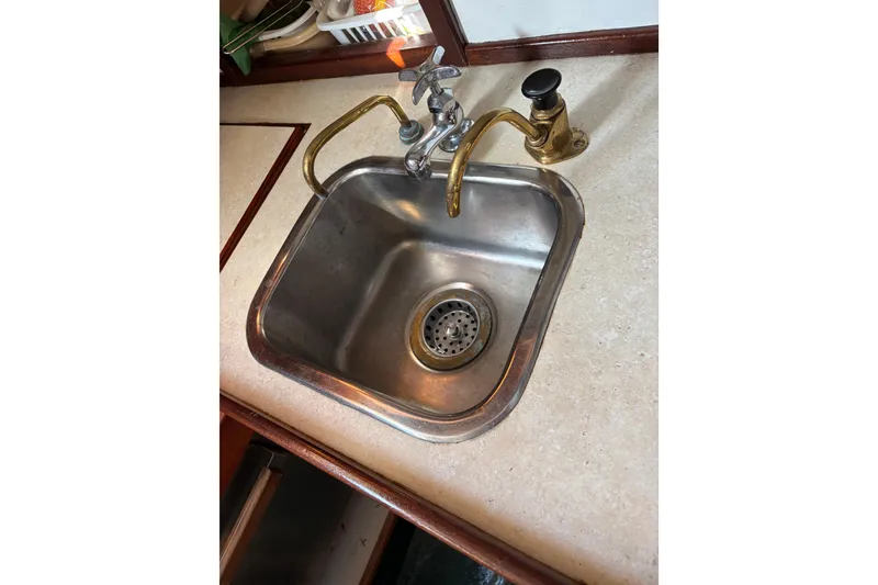 Slide: The Image of Stainless steel sink with brass faucet on Spencer 35, 1968 model boat. - 15