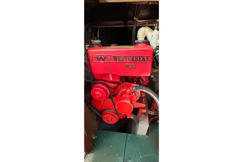Slide: The Image of Red Westerbeke diesel engine in a 1968 Spencer 35 boat. - 30