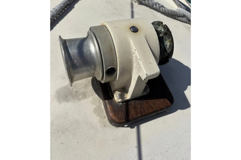 Slide: The Image of Vintage 1968 Spencer 35 boat winch on deck, featuring metal and wood components. - 33