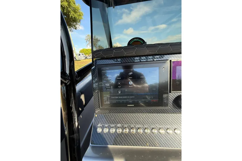 Slide: The Image of Dashboard of a 2006 Lazer 40 with Garmin navigation system. - 30