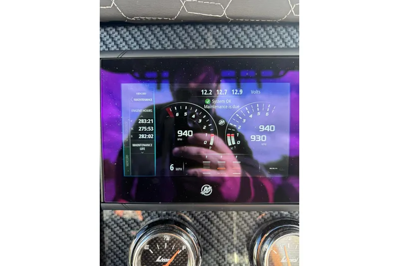 Slide: The Image of Dashboard of a 2006 Lazer 40 showing RPM, speed, and maintenance status. - 33