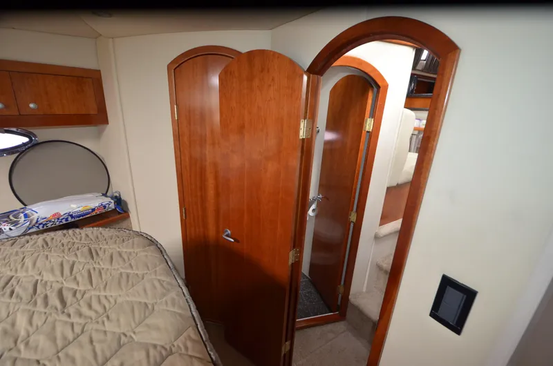 Slide: The Image of Interior of 2007 Cruisers Yachts 415 Express Motoryacht with wooden doors. - 12