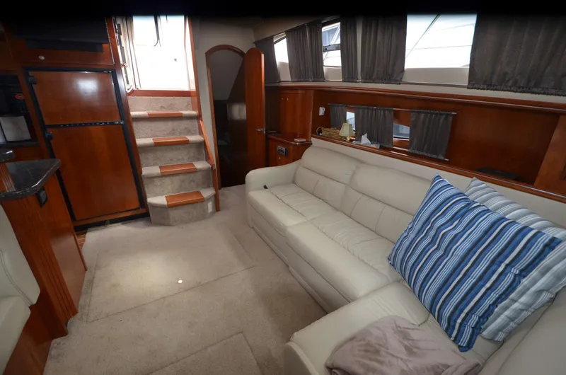 Slide: The Image of Interior of 2007 Cruisers Yachts 415 Express Motoryacht with sofa and stairs. - 17