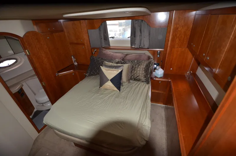 Slide: The Image of Luxurious bedroom in a 2007 Cruisers Yachts 415 Express Motoryacht. - 19