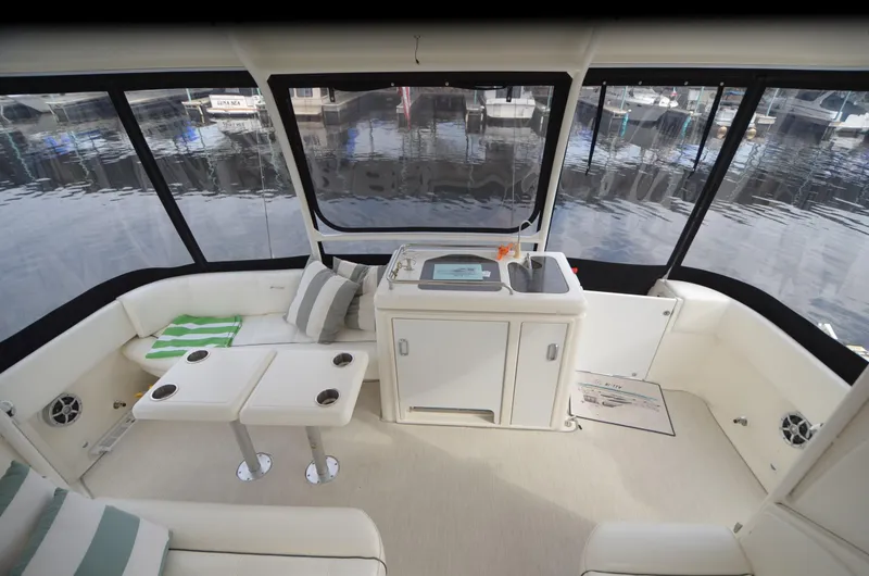 Slide: The Image of Interior of 2007 Cruisers Yachts 415 Express Motoryacht with seating and sink area. - 2