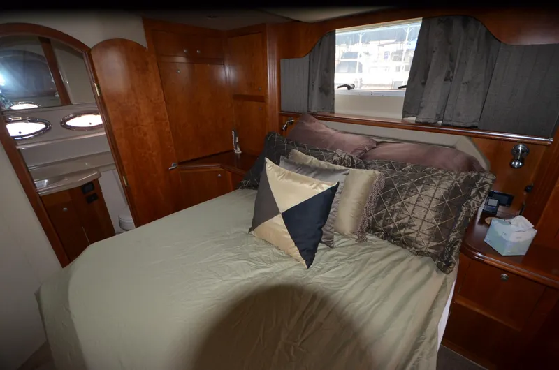 Slide: The Image of Luxurious bedroom in a 2007 Cruisers Yachts 415 Express Motoryacht. - 21