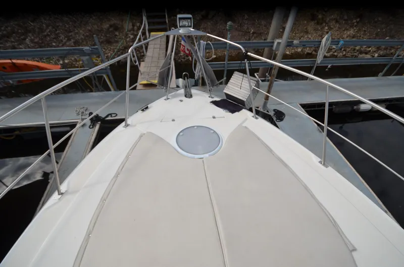 Slide: The Image of Deck of 2007 Cruisers Yachts 415 Express Motoryacht in harbor. - 22