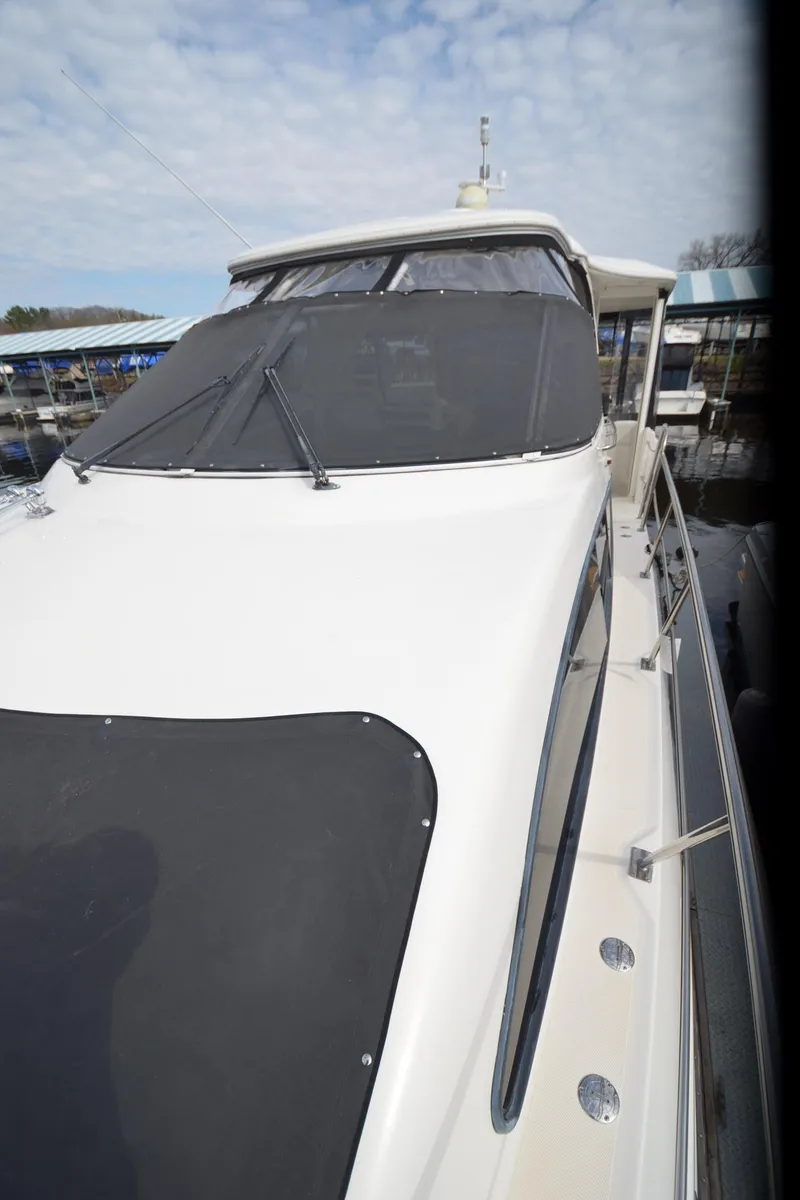 Slide: The Image of 2007 Cruisers Yachts 415 Express Motoryacht at dock. - 28