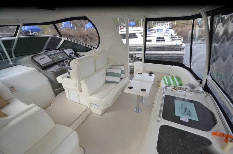 Slide: The Image of Interior of 2007 Cruisers Yachts 415 Express Motoryacht with seating area. - 3