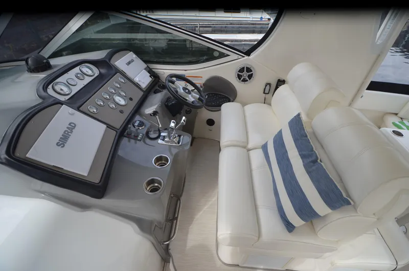 Slide: The Image of Interior of 2007 Cruisers Yachts 415 Express Motoryacht, helm and seating area. - 5