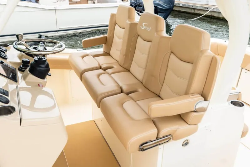Slide: The Image of Manufacturer Provided Image: 2021 Scout 355 LXF boat with luxurious tan leather seating. - 101