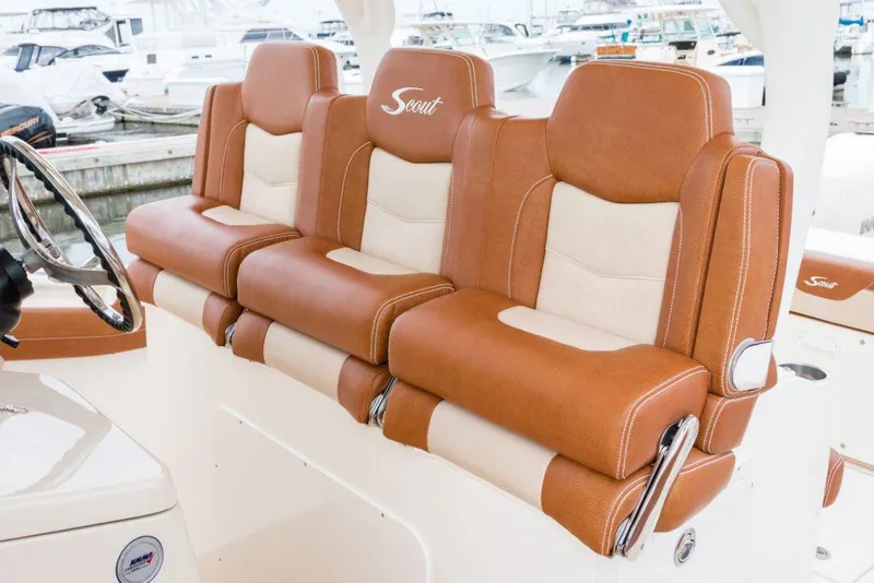 Slide: The Image of Manufacturer Provided Image: 2021 Scout 355 LXF boat with luxurious brown and beige seating. - 102