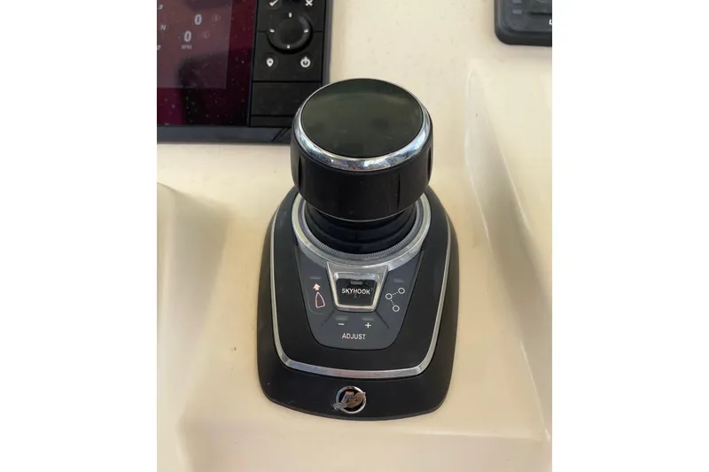 Slide: The Image of Joystick control panel on 2021 Scout 355 LXF boat dashboard. - 20