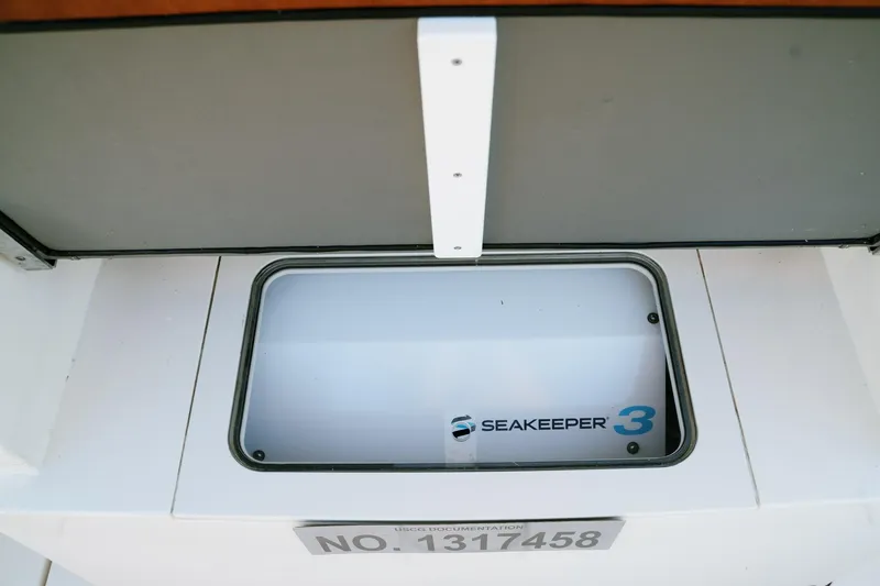 Slide: The Image of 2021 Scout 355 LXF boat featuring Seakeeper 3 stabilization system. - 27