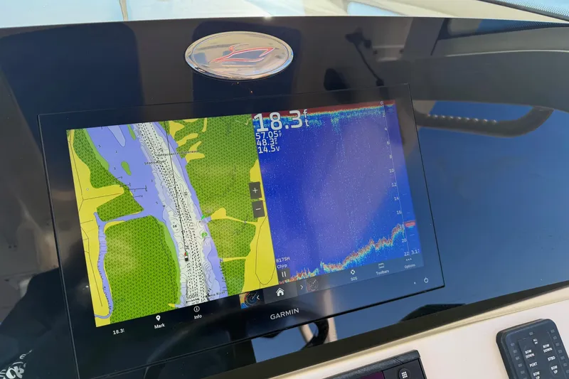 Slide: The Image of Garmin navigation display on 2021 Scout 355 LXF boat dashboard. - 65
