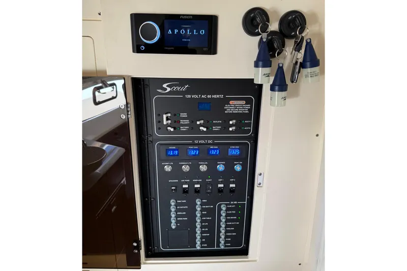 Slide: The Image of 2021 Scout 355 LXF electrical panel with Fusion Apollo stereo system. - 70